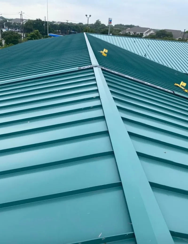 Green commercial metal roof ridge and valley for Metal Roof Repair in Shasta Lake